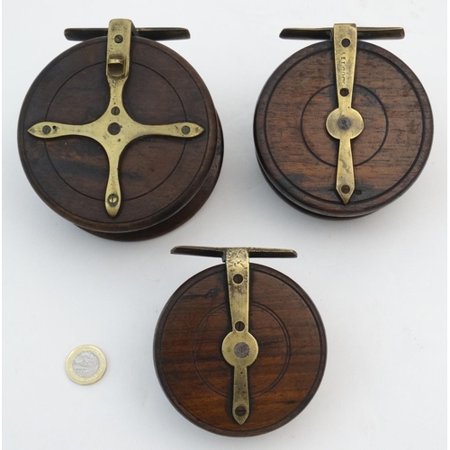 236 - Fishing : three old centre pin mahogany and brass with horn handles fishing reels , 3 1/2'' , Allcoc... 