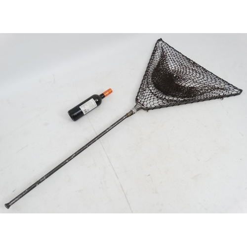 244 - Fishing: An unmarked brass and aluminium folding landing net with clip attachment