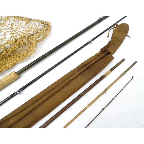 246 - Fishing :  a quantity of old fishing items to include a cloth cased fly rod, 2 part boat rod and lan... 