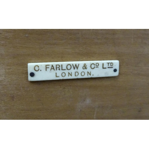 250 - Fly -Fishing : ' C Farlow & Co Ltd , London ' an old stained pine rod box  with leather straps, name... 