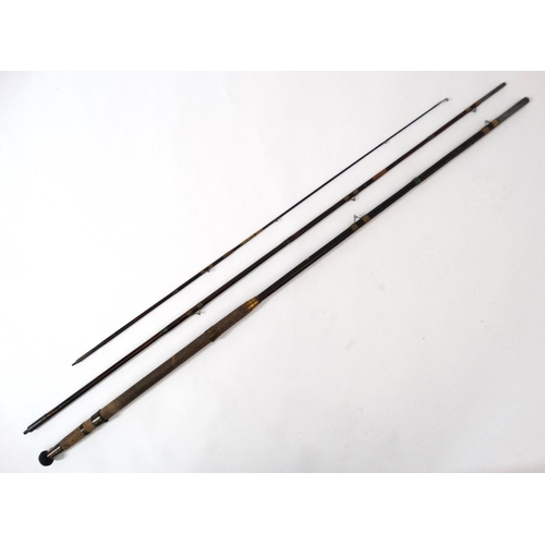 255 - Fishing : A traditional  11' , 3 piece stained cane bound rod with an associated cloth case