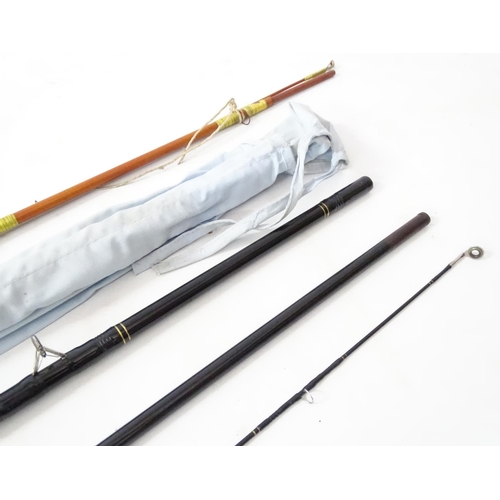 289 - Fly fishing : a fibre glass lightweight 2 sectional fly rod together with a Shakespeare Black Fly 16... 