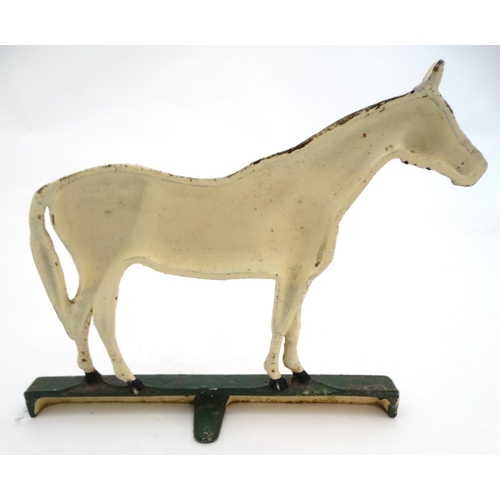 327 - A cast iron doorstop formed as a horse with polychrome decoration. 10'' high