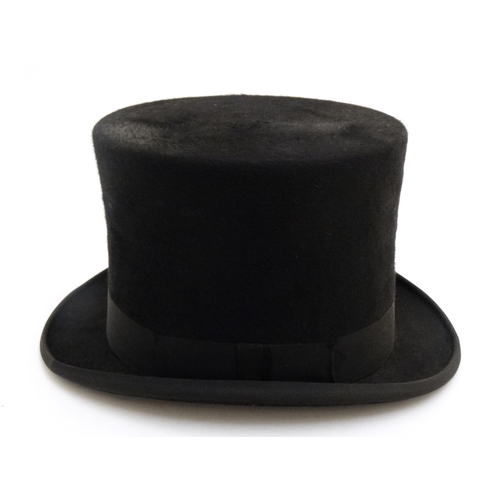 332 - A '' Christys' of London '' 100% fine fur felt handmade black top gentleman's top hat, with white si... 