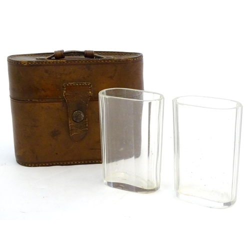 342 - Field Sports : A pair of  late 19thC / early 20thC glass beakers contained within a brown leather ca... 