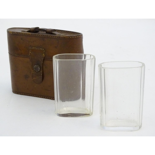 342 - Field Sports : A pair of  late 19thC / early 20thC glass beakers contained within a brown leather ca... 