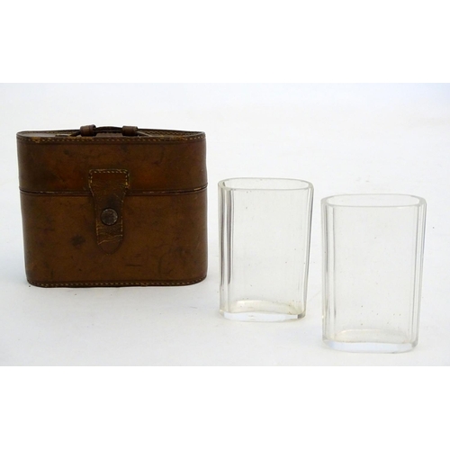 342 - Field Sports : A pair of  late 19thC / early 20thC glass beakers contained within a brown leather ca... 