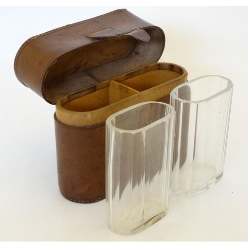 342 - Field Sports : A pair of  late 19thC / early 20thC glass beakers contained within a brown leather ca... 