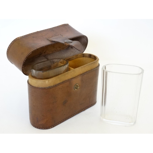 342 - Field Sports : A pair of  late 19thC / early 20thC glass beakers contained within a brown leather ca... 