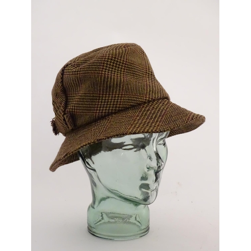 381 - Holland and Holland tweed brown hat