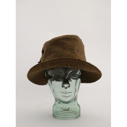 381 - Holland and Holland tweed brown hat