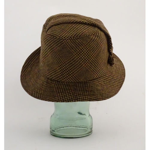 381 - Holland and Holland tweed brown hat