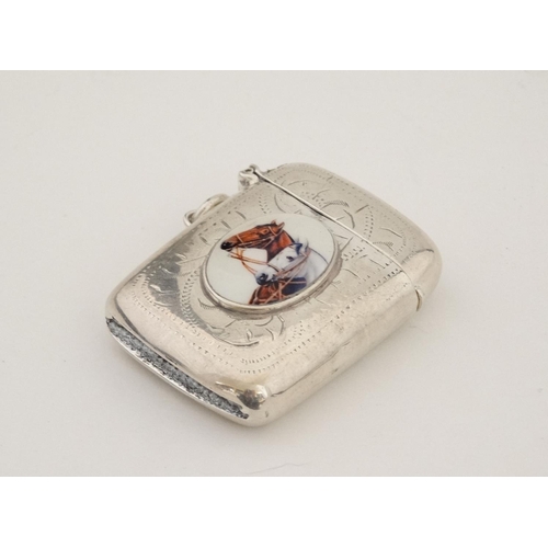 424 - A silver plate vesta case with later applied 21stC ceramic cabochon with horse head decoration. The ... 