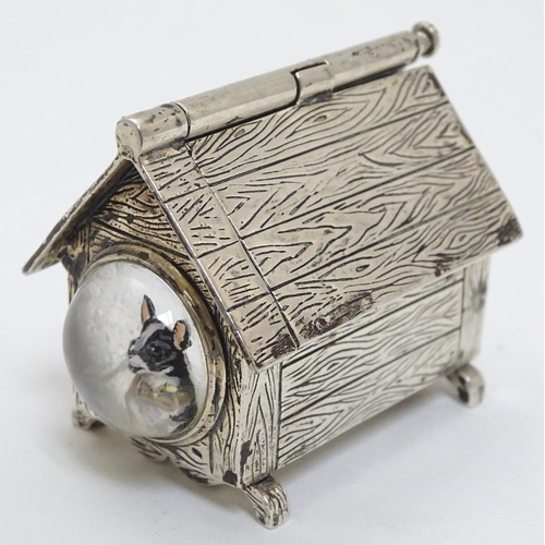 425 - A novelty silver vesta case formed as a dog kennel / dog house  with sprung action to roof, striker ... 