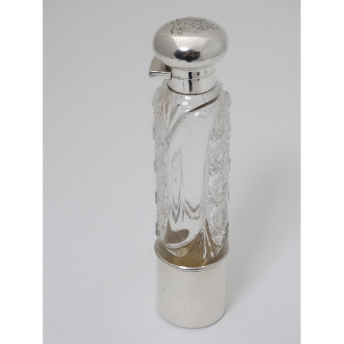 429 - A cut glass ladies hip flask of cylindrical form with silver top, mounts and beaker to lower. Hallma... 