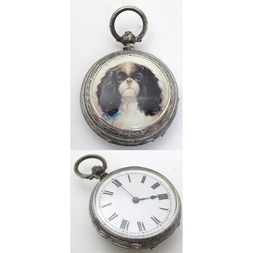 438 - A Continental .800 silver pocket / fob watch with enamel dial and later cabochon to reverse depictin... 