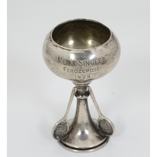 439 - A silver trophy cup with tennis racket decoration, hallmarked Birmingham 1924 maker Wilmot Manufactu... 