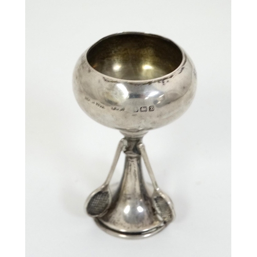 439 - A silver trophy cup with tennis racket decoration, hallmarked Birmingham 1924 maker Wilmot Manufactu... 