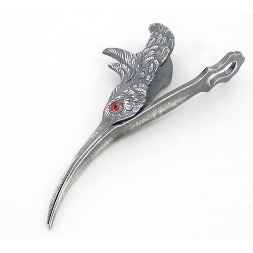 440 - A silver plate paper clip formed as a birds head with hinged beak. 5 1/4'' long