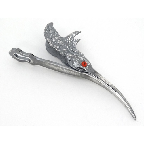 440 - A silver plate paper clip formed as a birds head with hinged beak. 5 1/4'' long