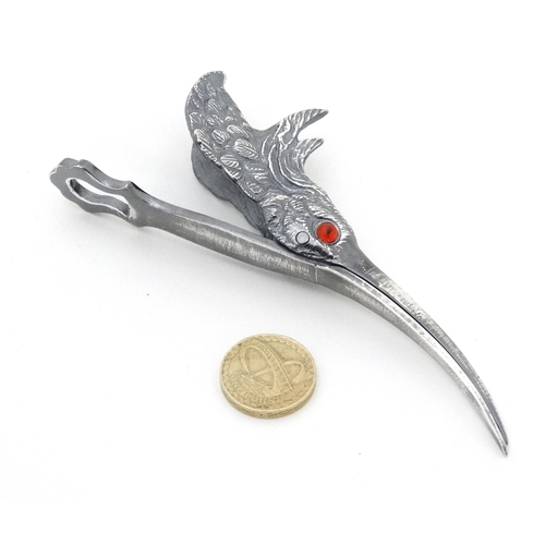 440 - A silver plate paper clip formed as a birds head with hinged beak. 5 1/4'' long