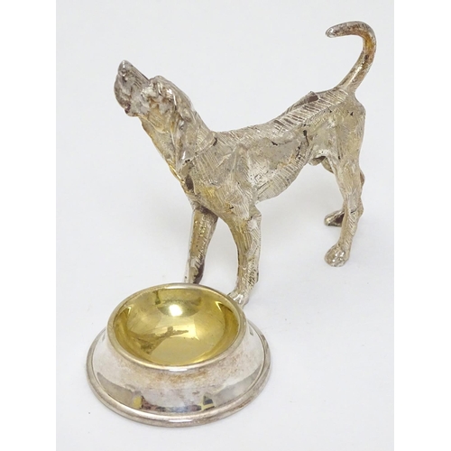 441 - A novelty silver plate table salt formed as a dog stood before a bowl. 21stC.  3 1/4'' high