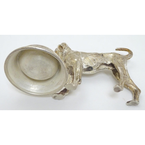 441 - A novelty silver plate table salt formed as a dog stood before a bowl. 21stC.  3 1/4'' high