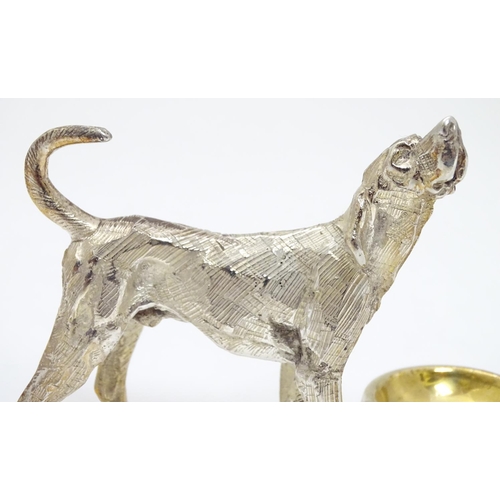 441 - A novelty silver plate table salt formed as a dog stood before a bowl. 21stC.  3 1/4'' high