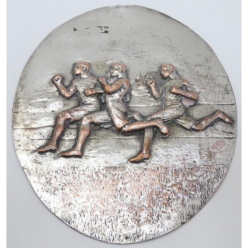 443 - Running / Athletics Interest : An early 20thC silver plate plaque of oval form with cast scene depic... 