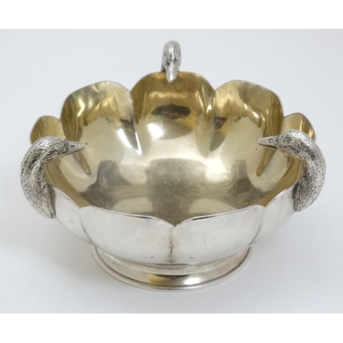 447 - A Lambidis silver plate bowl having 3 ducks head decoration and gilded interior approx 6 1/4'' diame... 