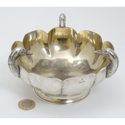 447 - A Lambidis silver plate bowl having 3 ducks head decoration and gilded interior approx 6 1/4'' diame... 