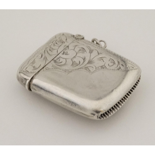 450 - A hallmarked silver vesta case with later applied 21stC ceramic cabochon depicting image of a pug do... 