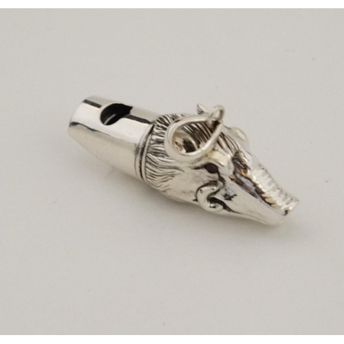 457 - A silver whistle with wild boar head decoration. marked '925 Sterling '. 21stC.  approx 1 3/4'' long