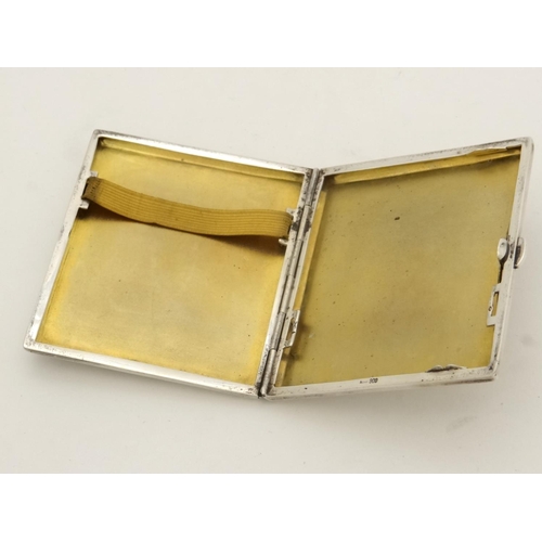 458 - A Continental 900 silver cigarette case with engine turned decoration and enamel scene to front depi... 