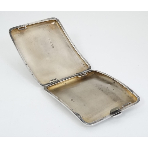 466 - A silver cigarette case hallmarked Birmingham 1921 with later applied Essex Crystal Cabochon depicti... 