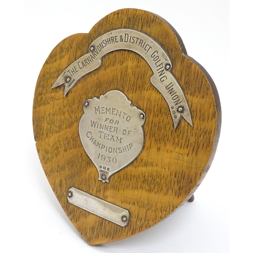 470 - Golfing Interest : A silver mounted oak presentation / trophy shield for Carnavonshire & District Go... 