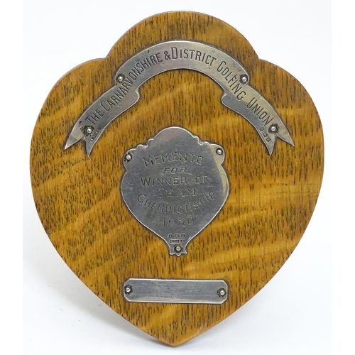 470 - Golfing Interest : A silver mounted oak presentation / trophy shield for Carnavonshire & District Go... 