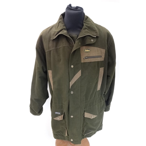 478 - A Laksen shooting jacket in khaki green in Gore-tex fabric, size XL