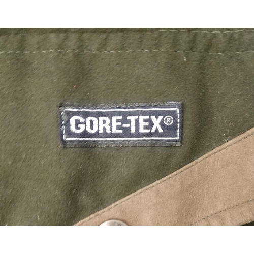 478 - A Laksen shooting jacket in khaki green in Gore-tex fabric, size XL