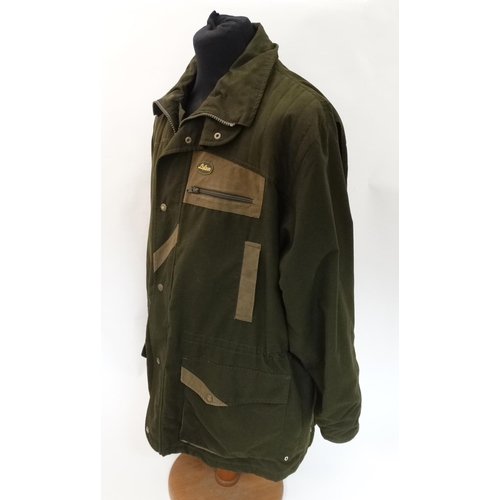 478 - A Laksen shooting jacket in khaki green in Gore-tex fabric, size XL