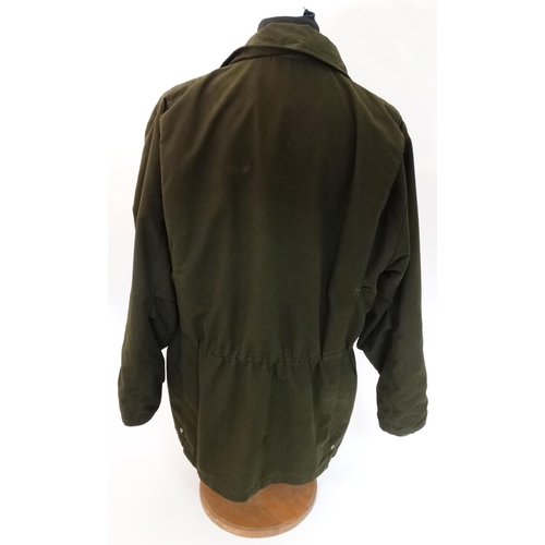 478 - A Laksen shooting jacket in khaki green in Gore-tex fabric, size XL