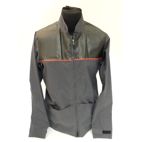 489 - A Musto Evolution Caly Shooting Jacket, in Carbon Lite colour, size M, with tags