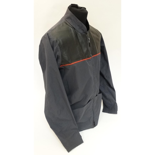 489 - A Musto Evolution Caly Shooting Jacket, in Carbon Lite colour, size M, with tags