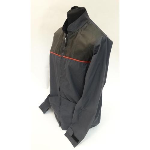 489 - A Musto Evolution Caly Shooting Jacket, in Carbon Lite colour, size M, with tags