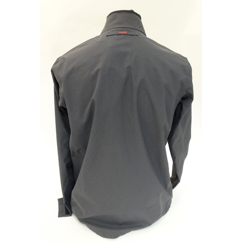 489 - A Musto Evolution Caly Shooting Jacket, in Carbon Lite colour, size M, with tags