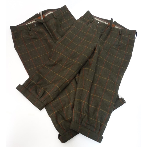 493 - Two pairs of Laksen Tarland waterproof tweed breeks, size 34 and 38, one with tags (2)