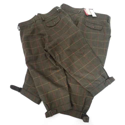 493 - Two pairs of Laksen Tarland waterproof tweed breeks, size 34 and 38, one with tags (2)