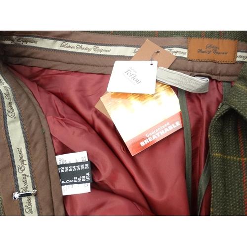 493 - Two pairs of Laksen Tarland waterproof tweed breeks, size 34 and 38, one with tags (2)