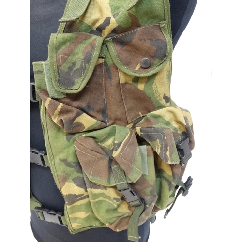 496 - A Cammo fishing  /hunting / photo waistcoat; multi pouches and pockets; mesh back and rucksack, Appr... 