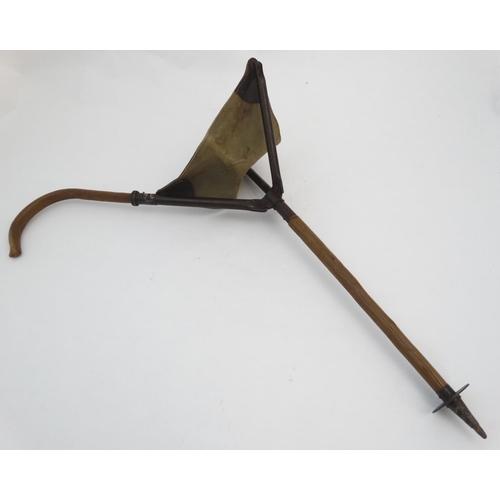 528 - Shooting stick: a mid 20thC shooting stick with triangular leather and canvas seat, the collar stamp... 